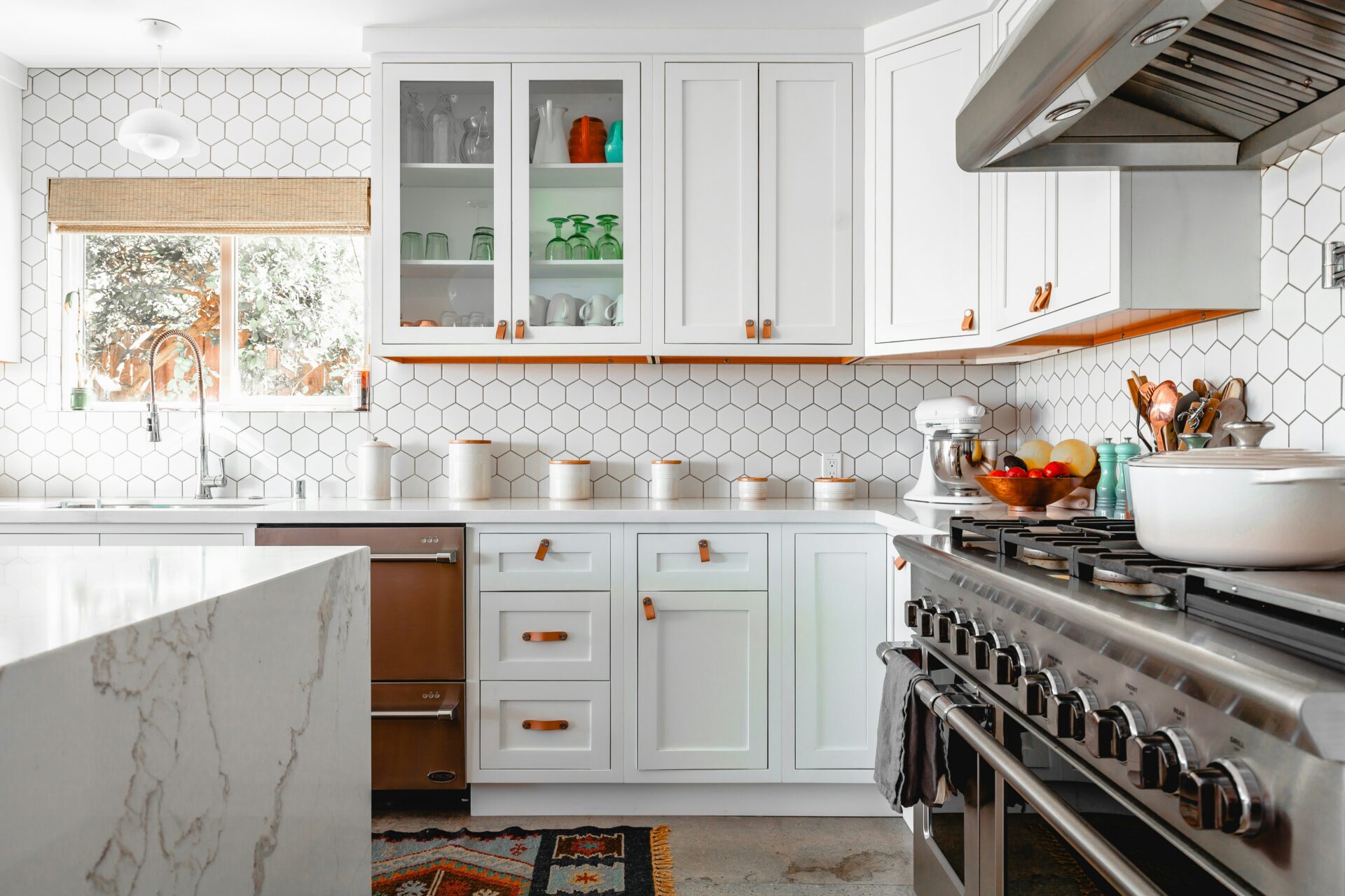 roam-in-color-z3QZ6gjGRt4-unsplash A beautiful kitchen with nice cabinets